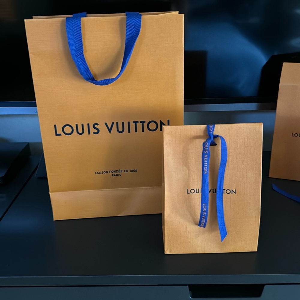 Louis Vuitton store bag and triangle box
